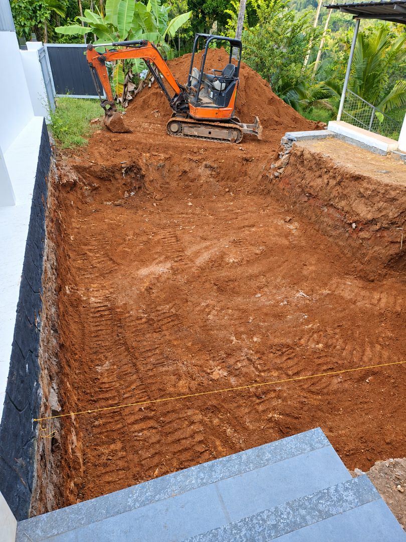 swimming pool construction process India Moothedan team at work
