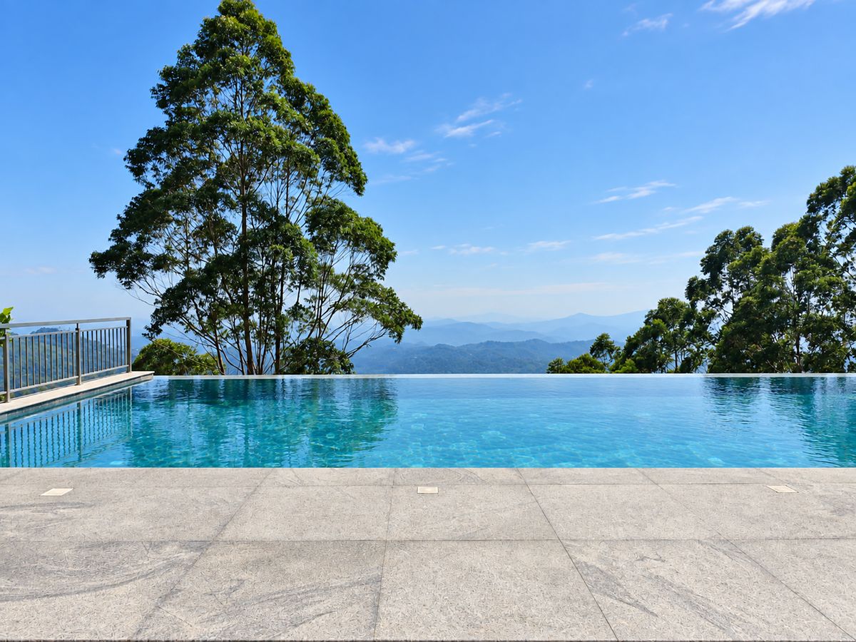 Fragrant Nature Munnar 18 x 8 m resort pool by Moothedan, a leading swimming pool builder in Kerala